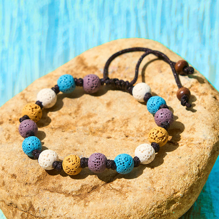 Braccialetto di supporto in pietra lavica colorata Buddha Stones - Perline bianche + blu + viola + gialle (circonferenza del polso: 15-22 cm) - image 15