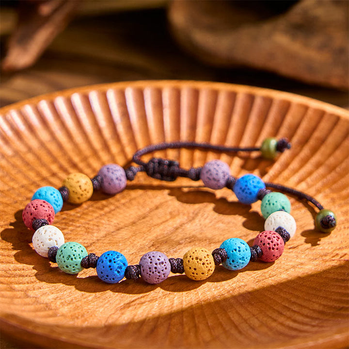 Braccialetto di supporto in pietra lavica colorata Buddha Stones - image 3