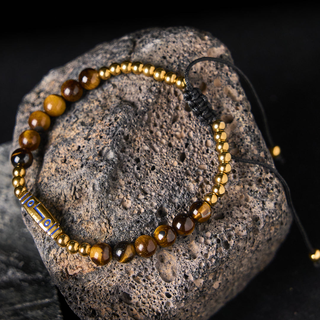 Braccialetto con perline di coraggio in occhio di tigre con motivo a osso e Buddha Stones - Occhio di tigre giallo e acciaio al titanio (circonferenza del polso: 15-21 cm) - image 1