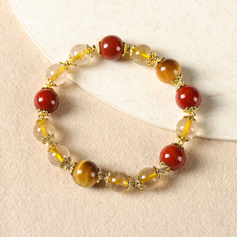 Bracciale della ricchezza con perle di occhio di tigre, quarzo rutilato dorato naturale Buddha Stones - image 1