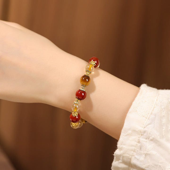 Bracciale della ricchezza con perle di occhio di tigre, quarzo rutilato dorato naturale Buddha Stones - image 9