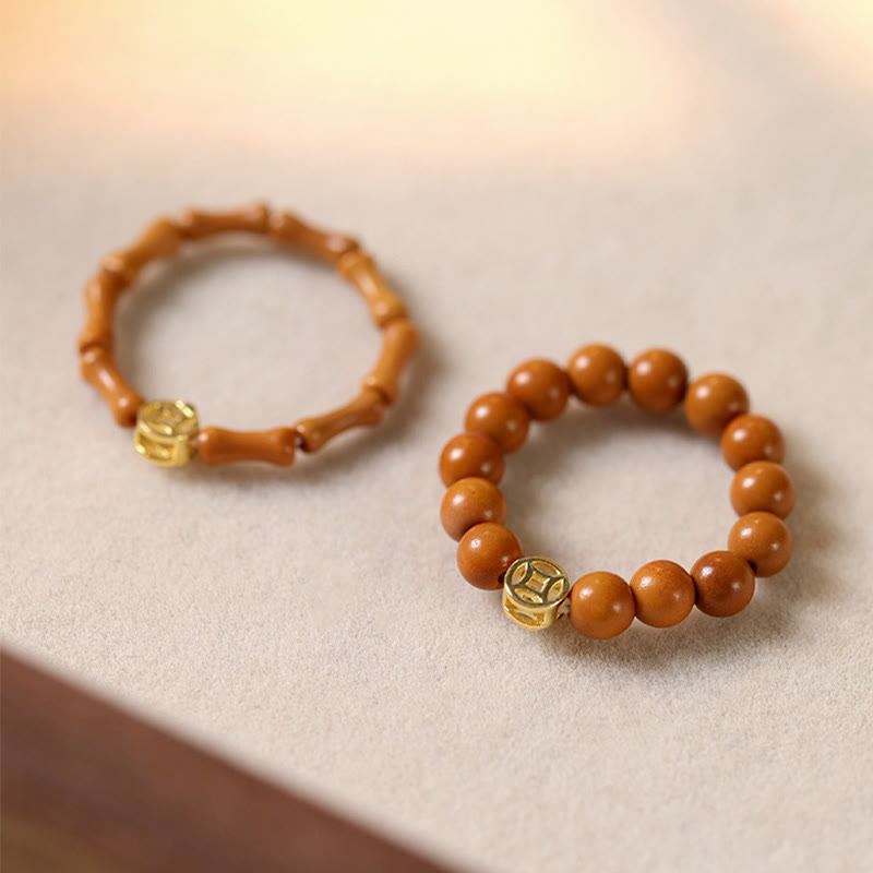 Anello di resistenza interna con moneta di rame e perlina di nocciolo di oliva Buddha Stones - image 0