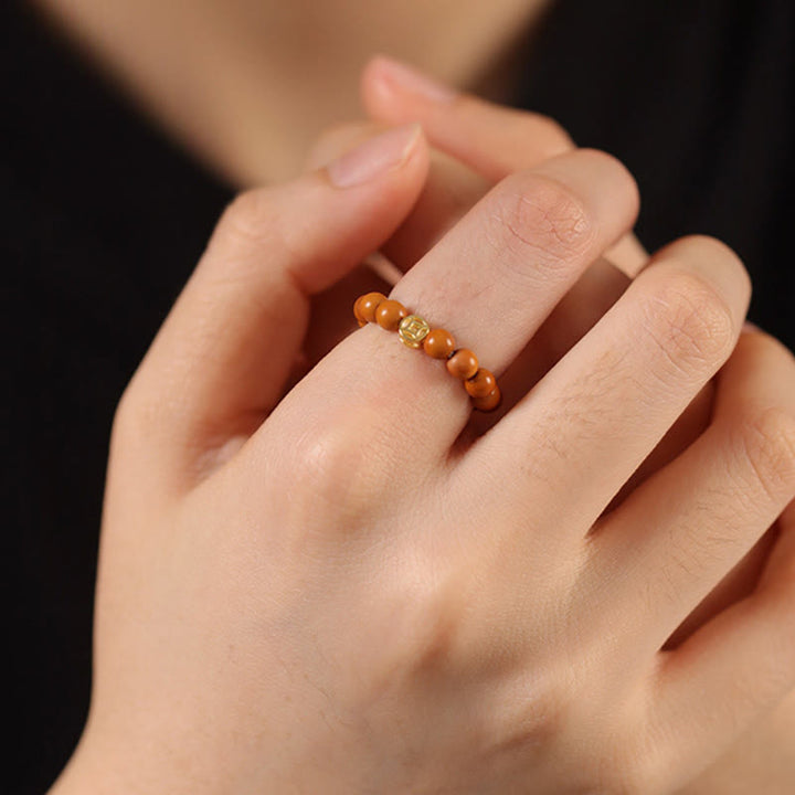 Anello di resistenza interna con moneta di rame e perlina di nocciolo di oliva Buddha Stones - image 16
