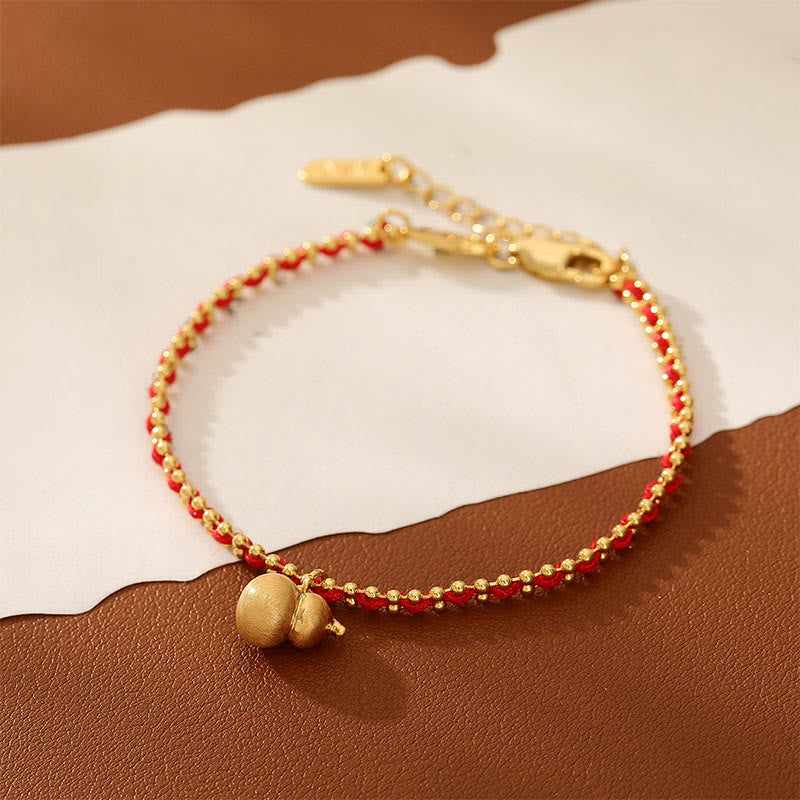 Bracciale Buddha Stones in corda rossa, rame e ottone, zucca, forza e ricchezza - image 1