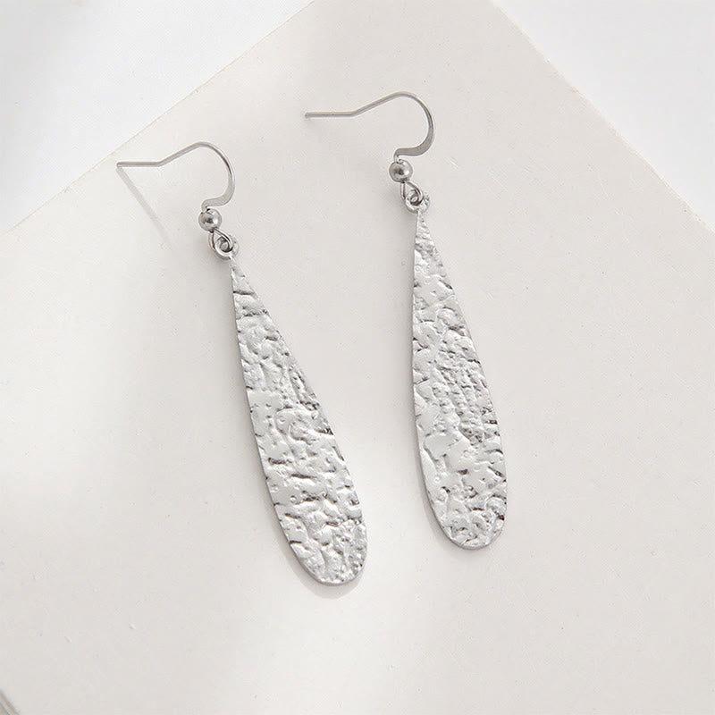 Orecchini eleganti con martelli in acciaio al titanio Buddha Stones - Forma a goccia argentata (montanti in acciaio al titanio) - image 1