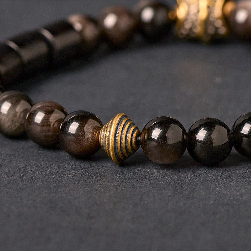 Braccialetto di protezione in ebano e ossidiana lucida color argento Buddha Stones - image 3