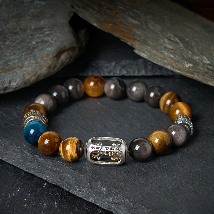 Bracciale Buddha Stones in argento lucido, ossidiana, occhio di tigre, Om Mani Padme Hum, Buddha a tre facce, positivo - image 1