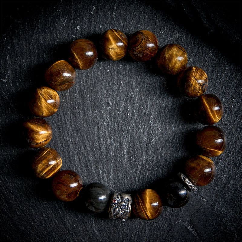 Braccialetto di protezione per la testa del Buddha in ossidiana lucida e argento Buddha Stones e occhio di tigre - image 1