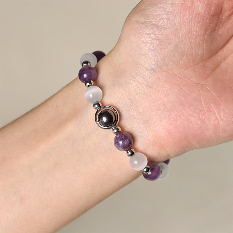 Braccialetto di equilibrio con perle di occhio di gatto bianco e ametista naturale Buddha Stones - image 3