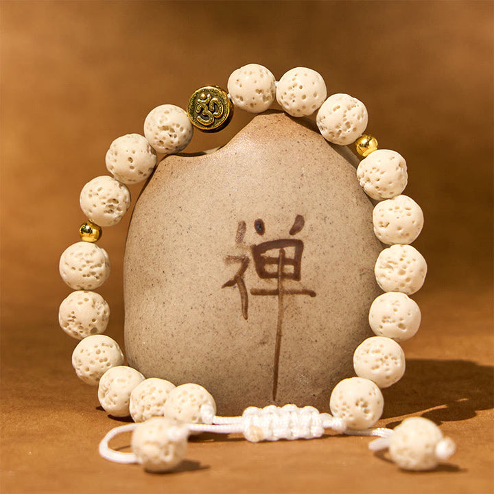 Braccialetto di guarigione calma con simbolo Om Buddha Stones in pietra lavica bianca - image 1