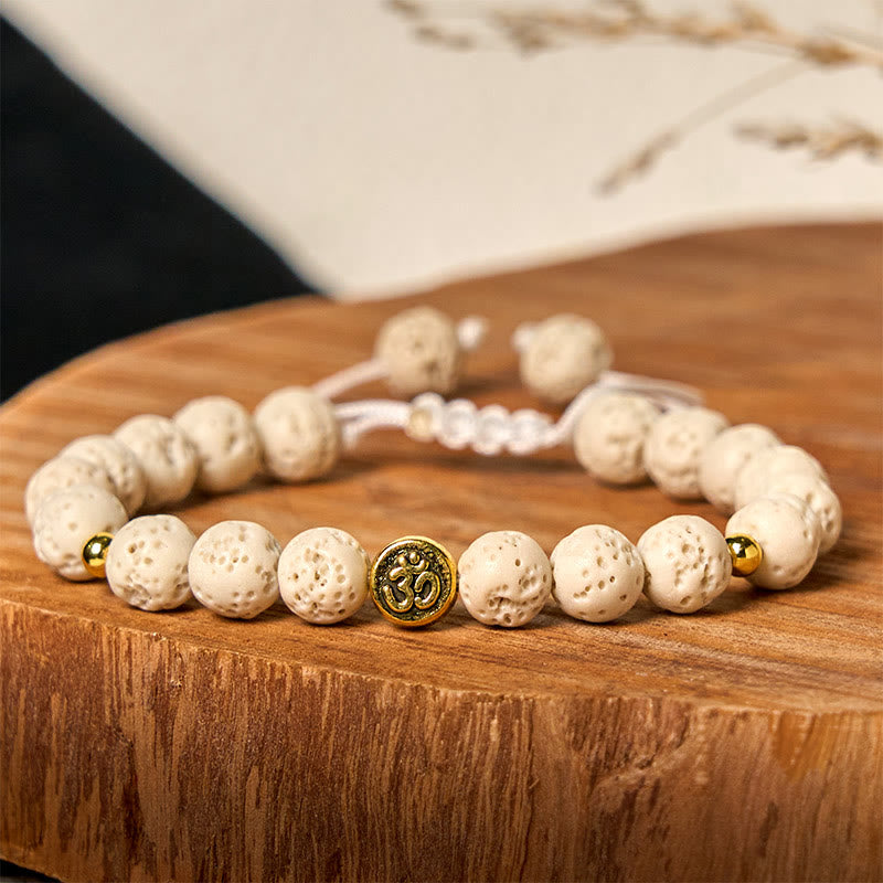Braccialetto di guarigione calma con simbolo Om Buddha Stones in pietra lavica bianca - image 2