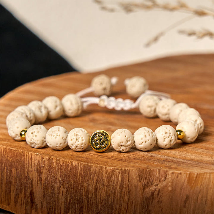 Braccialetto di guarigione calma con simbolo Om Buddha Stones in pietra lavica bianca - image 2