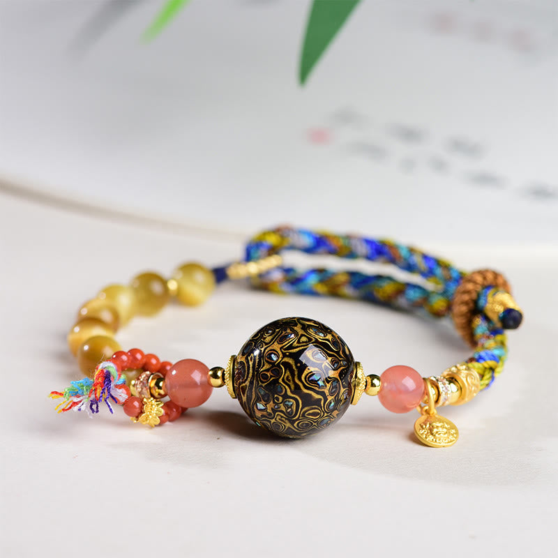 Braccialetto di protezione in pietra di occhio di tigre intrecciato a mano con perline di lacca tibetana Buddha Stones - Perle di lacca e occhio di tigre (circonferenza del polso: 15-25 cm) - image 0