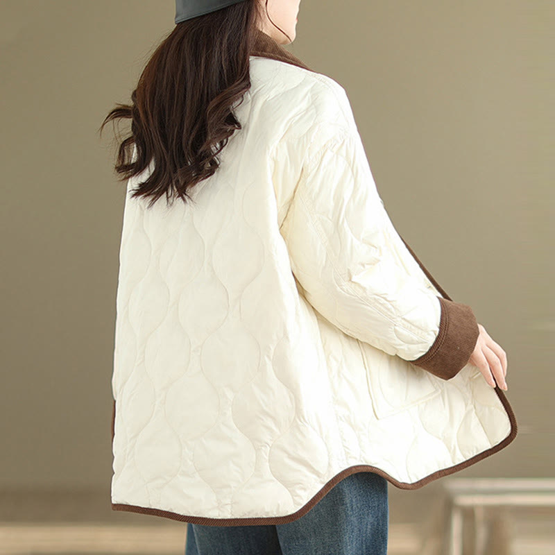 Giacca da donna in cotone a maniche lunghe con tasche e risvolto in colore contrastante Buddha Stones - image 1