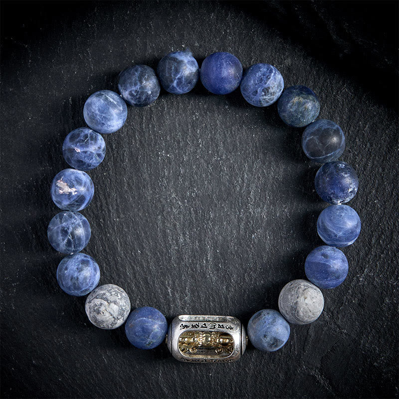 Bracciale dell'armonia Om Mani Padme Hum in pietra naturale di sodalite grigia di Buddha Stones - 20 centimetri - image 0