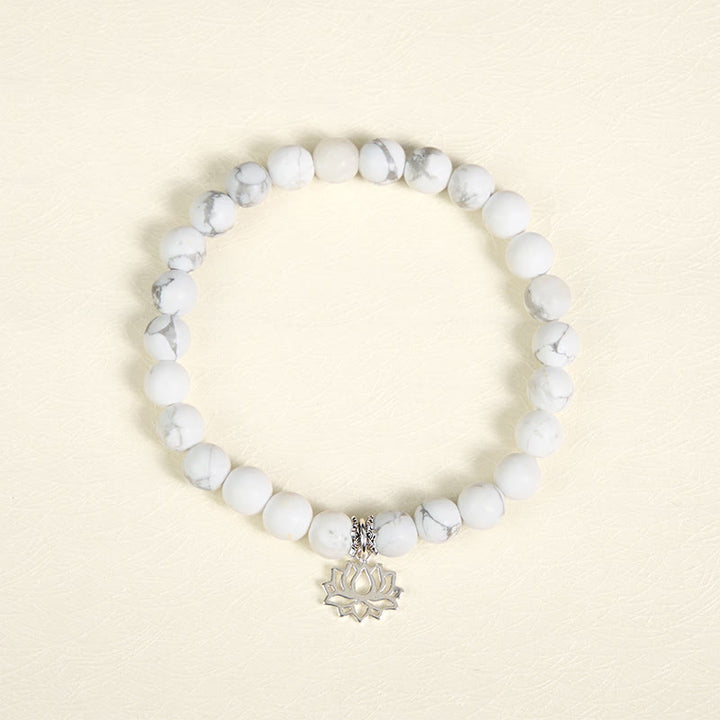Bracciale Buddha Stones in argento sterling 925 con motivo a loto e turchese bianco naturale, simbolo della ricchezza - image 2