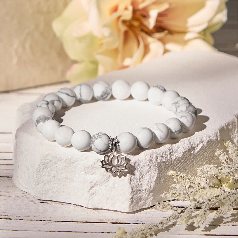 Bracciale Buddha Stones in argento sterling 925 con motivo a loto e turchese bianco naturale, simbolo della ricchezza - image 11