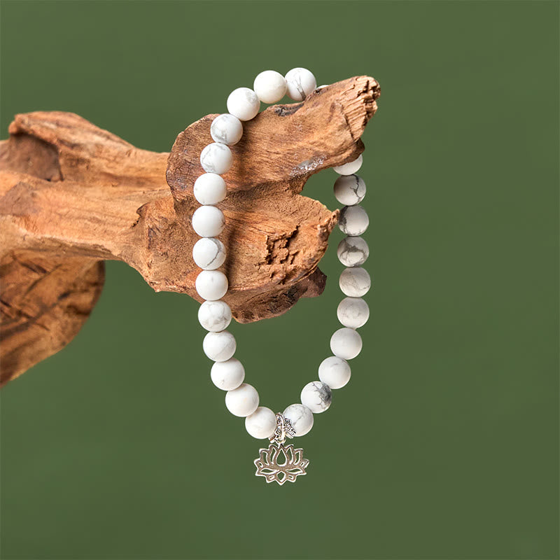 Bracciale Buddha Stones in argento sterling 925 con motivo a loto e turchese bianco naturale, simbolo della ricchezza - image 3