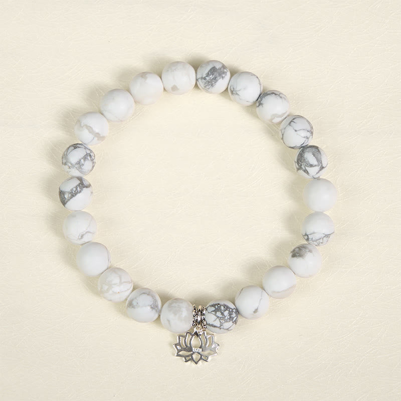 Bracciale Buddha Stones in argento sterling 925 con motivo a loto e turchese bianco naturale, simbolo della ricchezza - image 12