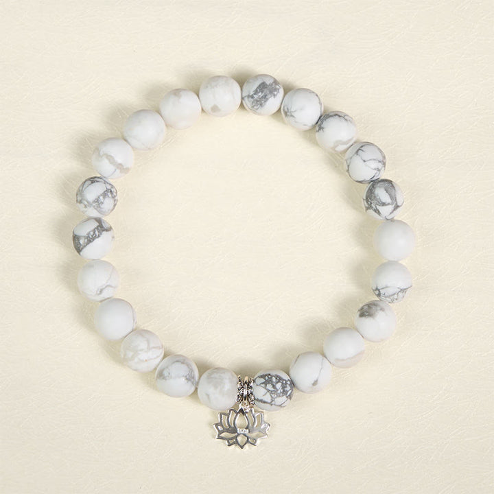 Bracciale Buddha Stones in argento sterling 925 con motivo a loto e turchese bianco naturale, simbolo della ricchezza - image 12