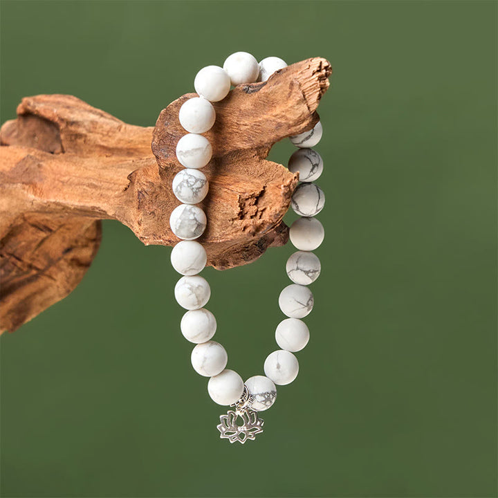Bracciale Buddha Stones in argento sterling 925 con motivo a loto e turchese bianco naturale, simbolo della ricchezza - image 13
