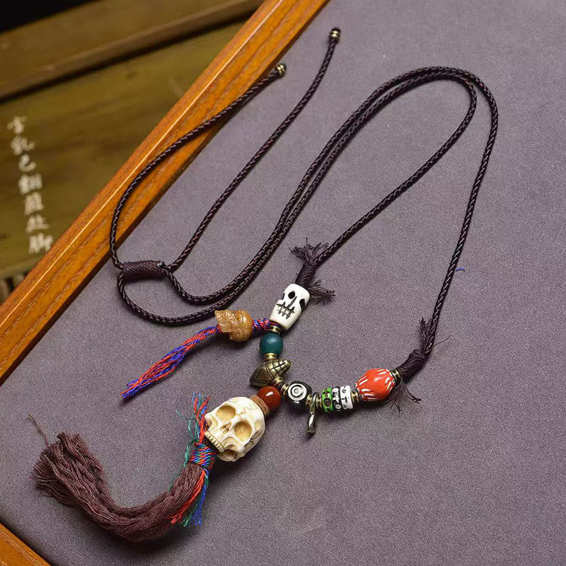 Collana con ciondolo a forma di teschio tibetano Buddha Stones, il Signore della Foresta dei Cadaveri, che tiene lontani gli spiriti maligni. - Teschio beige - image 0