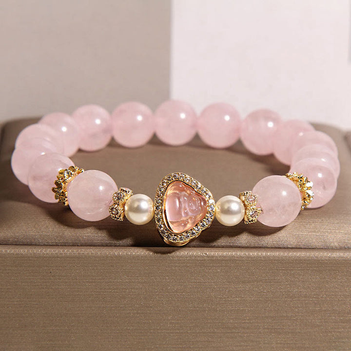 Braccialetto di calore con perle di cristallo rosa e simbolo naturale Buddha Stones Buddha - Cristallo rosa (Circonferenza del polso: 15-17 cm) - image 0