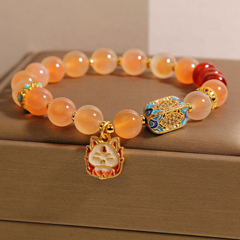 Braccialetto curativo in agata arancione caramellata naturale con volpe a nove code Buddha Stones - image 2