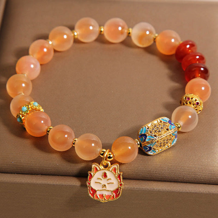 Braccialetto curativo in agata arancione caramellata naturale con volpe a nove code Buddha Stones - image 3