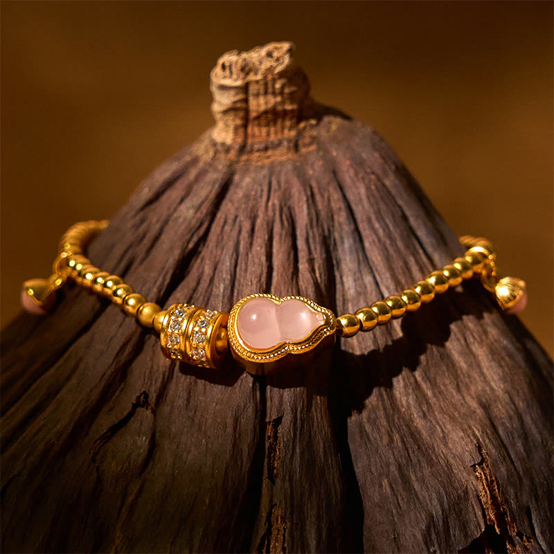 Bracciale della ricchezza con perline di zucca placcate in rame e ottone Buddha Stones - image 1