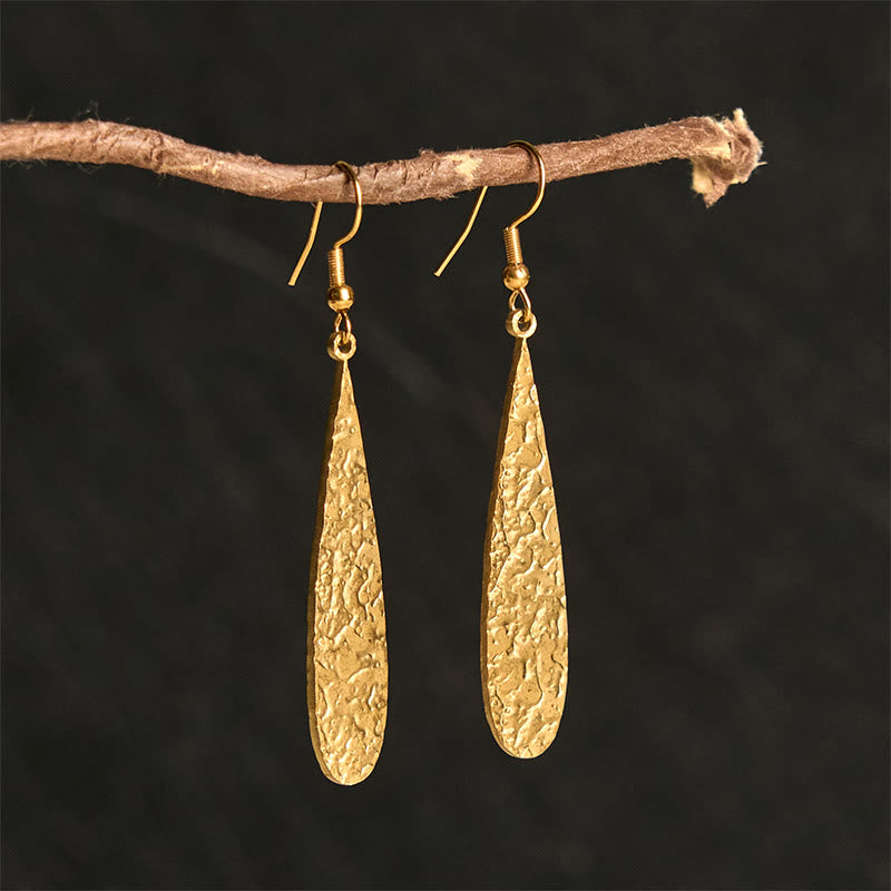 Orecchini eleganti con martelli in acciaio al titanio Buddha Stones - Forma a goccia dorata (montanti in acciaio al titanio) - image 0