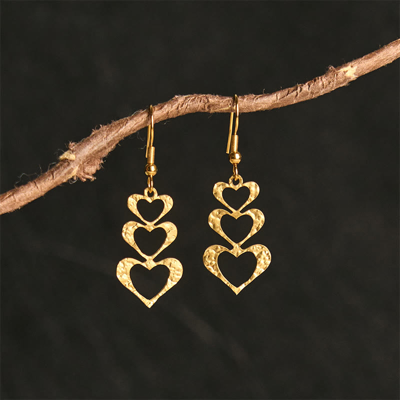 Orecchini eleganti con martelli in acciaio al titanio Buddha Stones - Forma di cuore dorato (montanti in acciaio al titanio) - image 11
