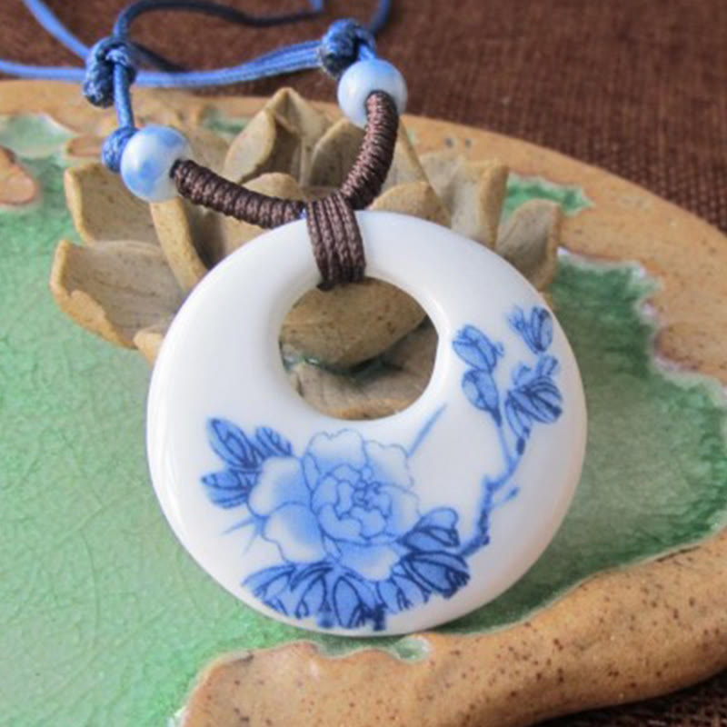 Buddha Stones con ciondolo dell'illuminazione in ceramica con simbolo di loto, simbolo etnico di peonia e fiori di pesco. - image 1