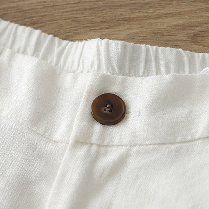 Pantaloni larghi da donna in cotone tinta unita con bottoni e tasche, modello Buddha Stones - image 9