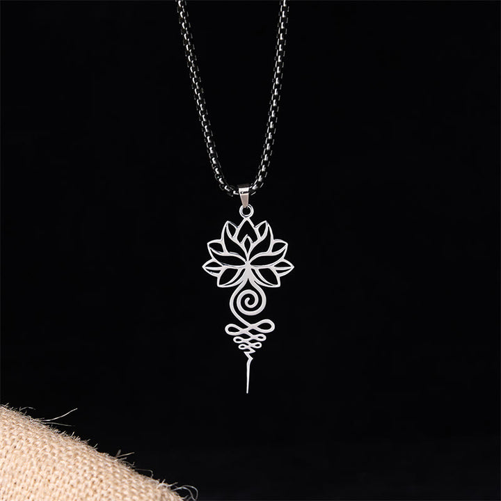 Collana con ciondolo dell'illuminazione in acciaio inossidabile, simbolo del chakra del loto di Buddha Stones Unalome - image 1