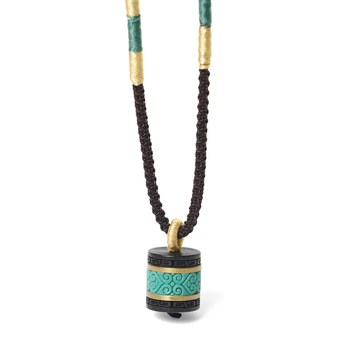Collana con ciondolo della pace in legno di ebano e turchese Buddha Stones - image 6