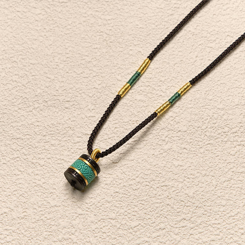 Collana con ciondolo della pace in legno di ebano e turchese Buddha Stones - image 3