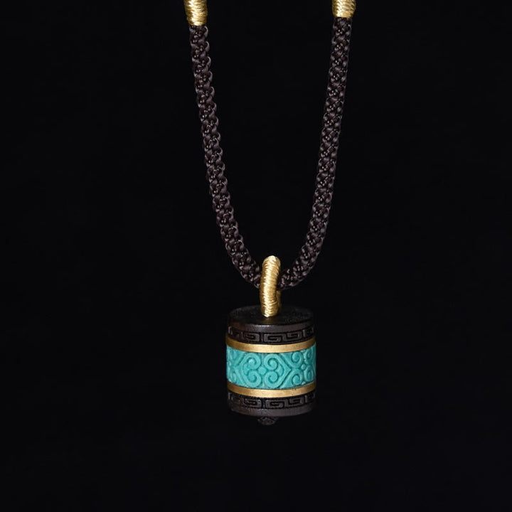Collana con ciondolo della pace in legno di ebano e turchese Buddha Stones - image 2