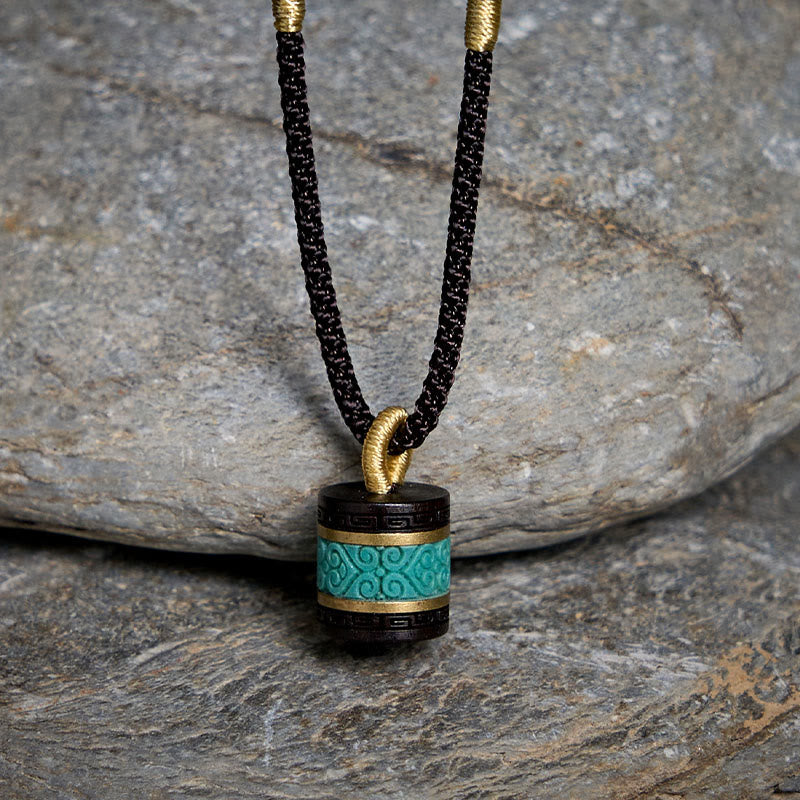 Collana con ciondolo della pace in legno di ebano e turchese Buddha Stones - image 1