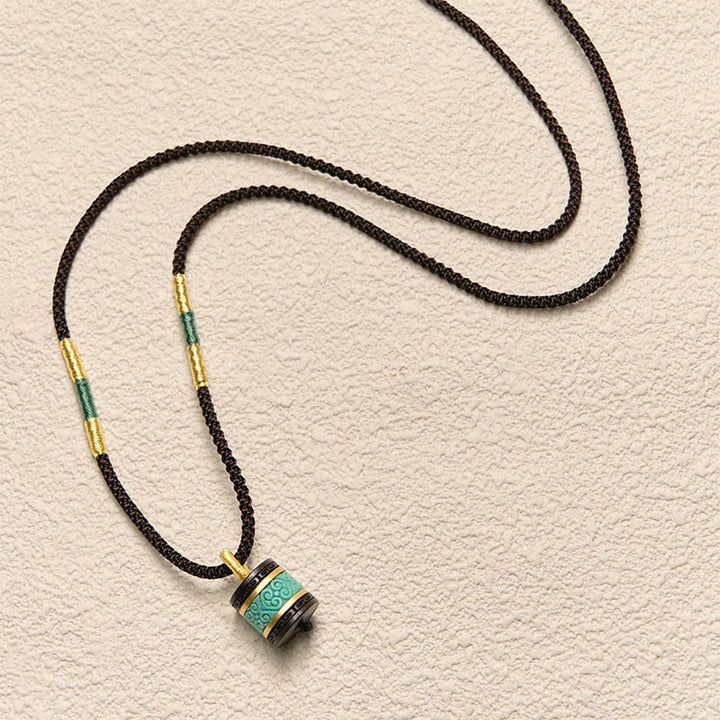 Collana con ciondolo della pace in legno di ebano e turchese Buddha Stones - image 4
