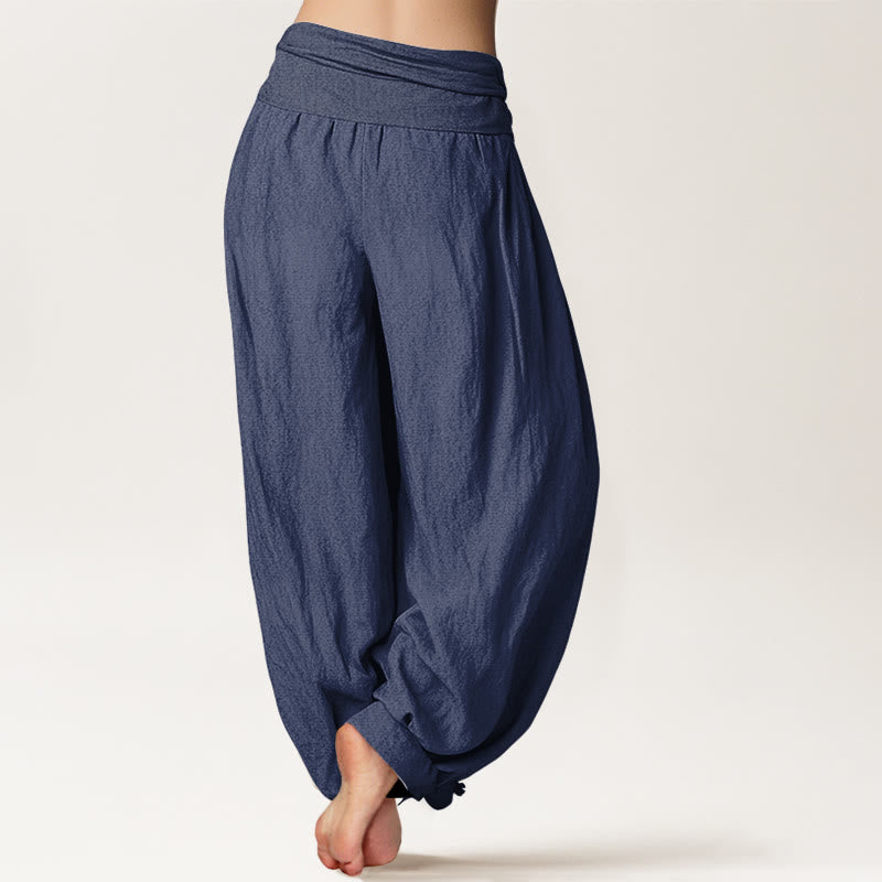 Pantaloni harem in cotone con elastico in vita e motivo con Buddha Stones, loto in fiore e simbolo Om - image 1