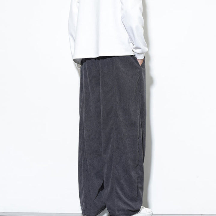 Pantaloni harem da uomo in puro velluto a coste con coulisse e tasche, con motivo Buddha Stones. - image 12