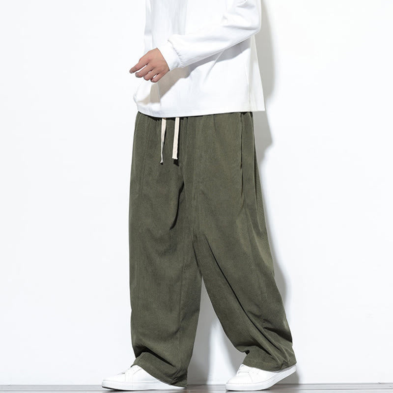 Pantaloni harem da uomo in puro velluto a coste con coulisse e tasche, con motivo Buddha Stones. - image 3