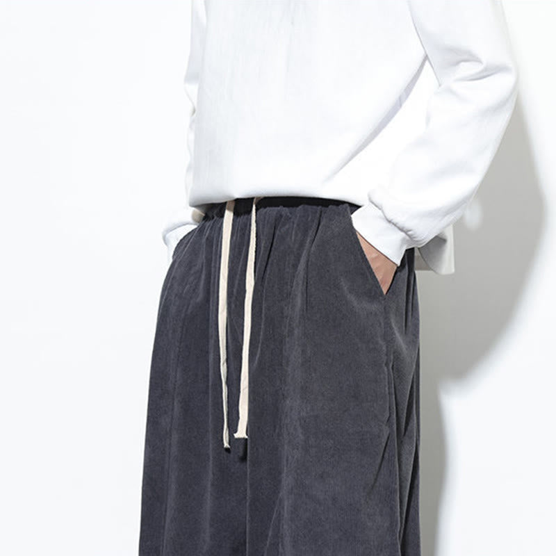 Pantaloni harem da uomo in puro velluto a coste con coulisse e tasche, con motivo Buddha Stones. - image 21