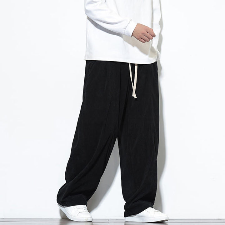 Pantaloni harem da uomo in puro velluto a coste con coulisse e tasche, con motivo Buddha Stones. - image 25