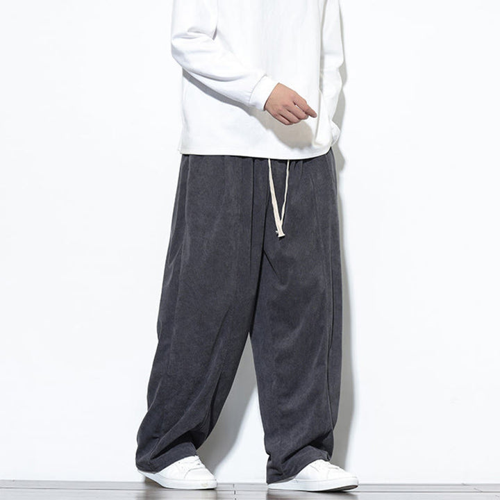 Pantaloni harem da uomo in puro velluto a coste con coulisse e tasche, con motivo Buddha Stones. - image 14