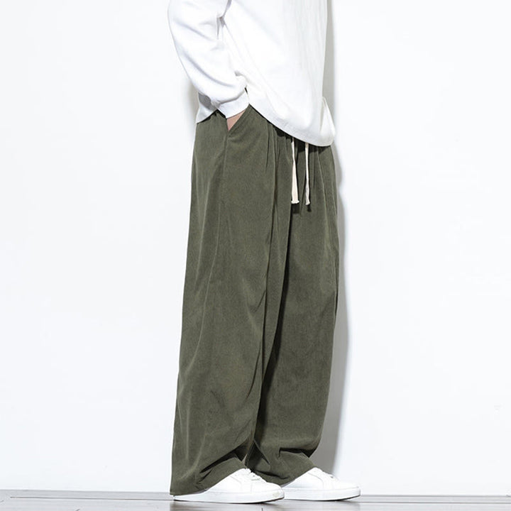 Pantaloni harem da uomo in puro velluto a coste con coulisse e tasche, con motivo Buddha Stones. - image 8