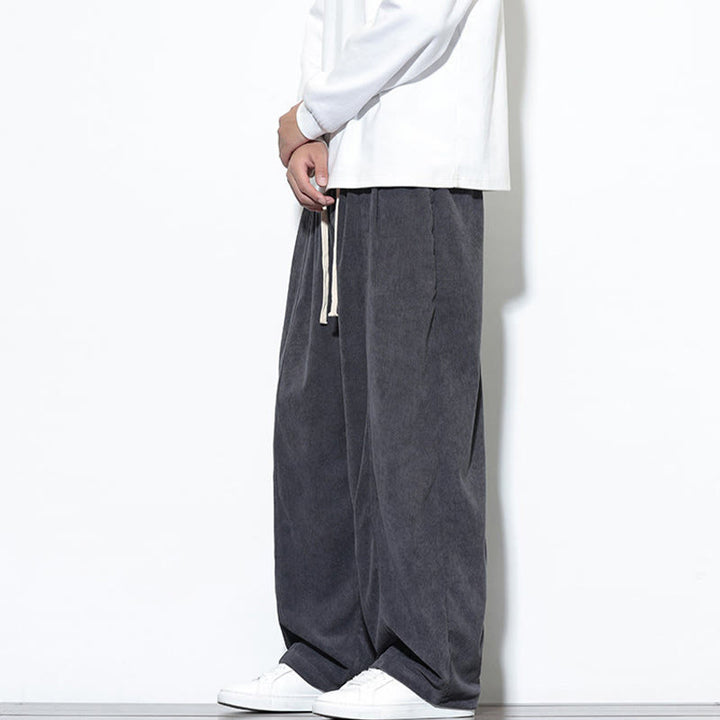 Pantaloni harem da uomo in puro velluto a coste con coulisse e tasche, con motivo Buddha Stones. - image 11