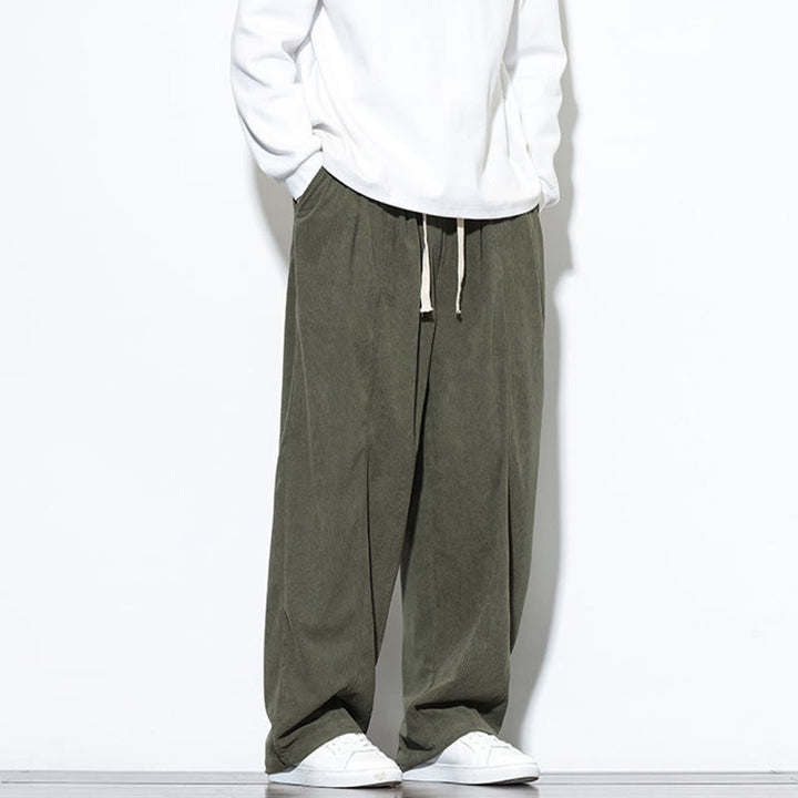 Pantaloni harem da uomo in puro velluto a coste con coulisse e tasche, con motivo Buddha Stones. - image 9