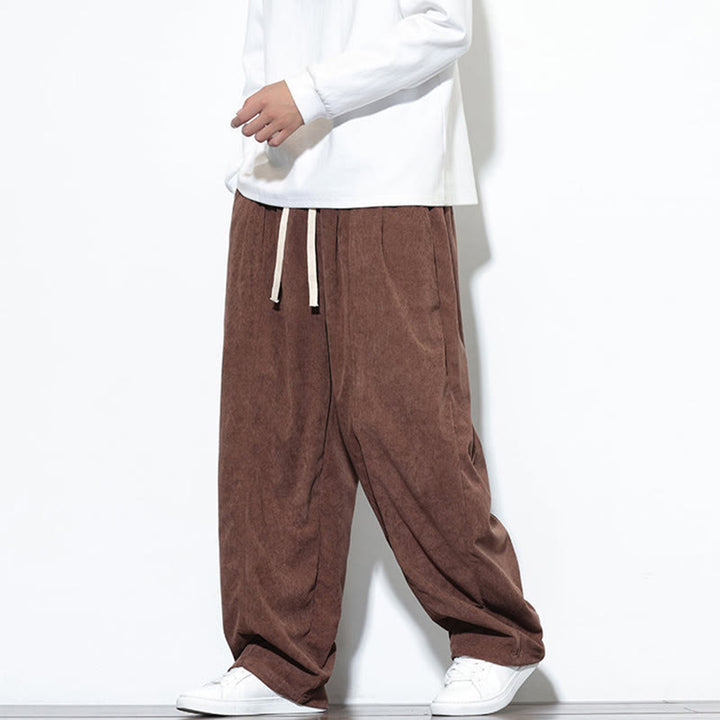 Pantaloni harem da uomo in puro velluto a coste con coulisse e tasche, con motivo Buddha Stones. - image 32